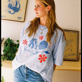 Cloud Surfing by Easty Beasty in Baby Blue - Artist Collaboration Tee