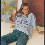 Cloud Surfing by Easty Beasty in Baby Blue - Artist Collaboration Tee